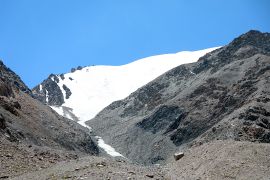 Road across the high-mountain valley
